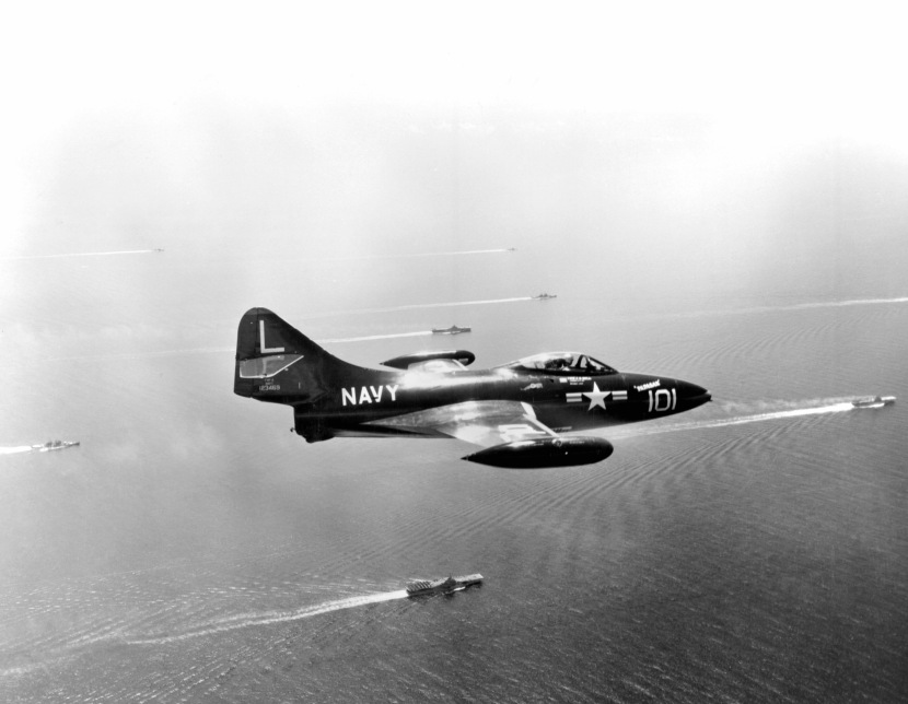 F9F attached to the USS BON HOMME RICHARD (CVA31) flies over task force 77 engaged in 3 carrier operations against North Korean targets.  The carriers are USS BON HOMME RICHARD (CVA31) USS ESSEX (CVA9) and the USS PRINCETON (CVA37). NARA FILE #:  80-G-480645